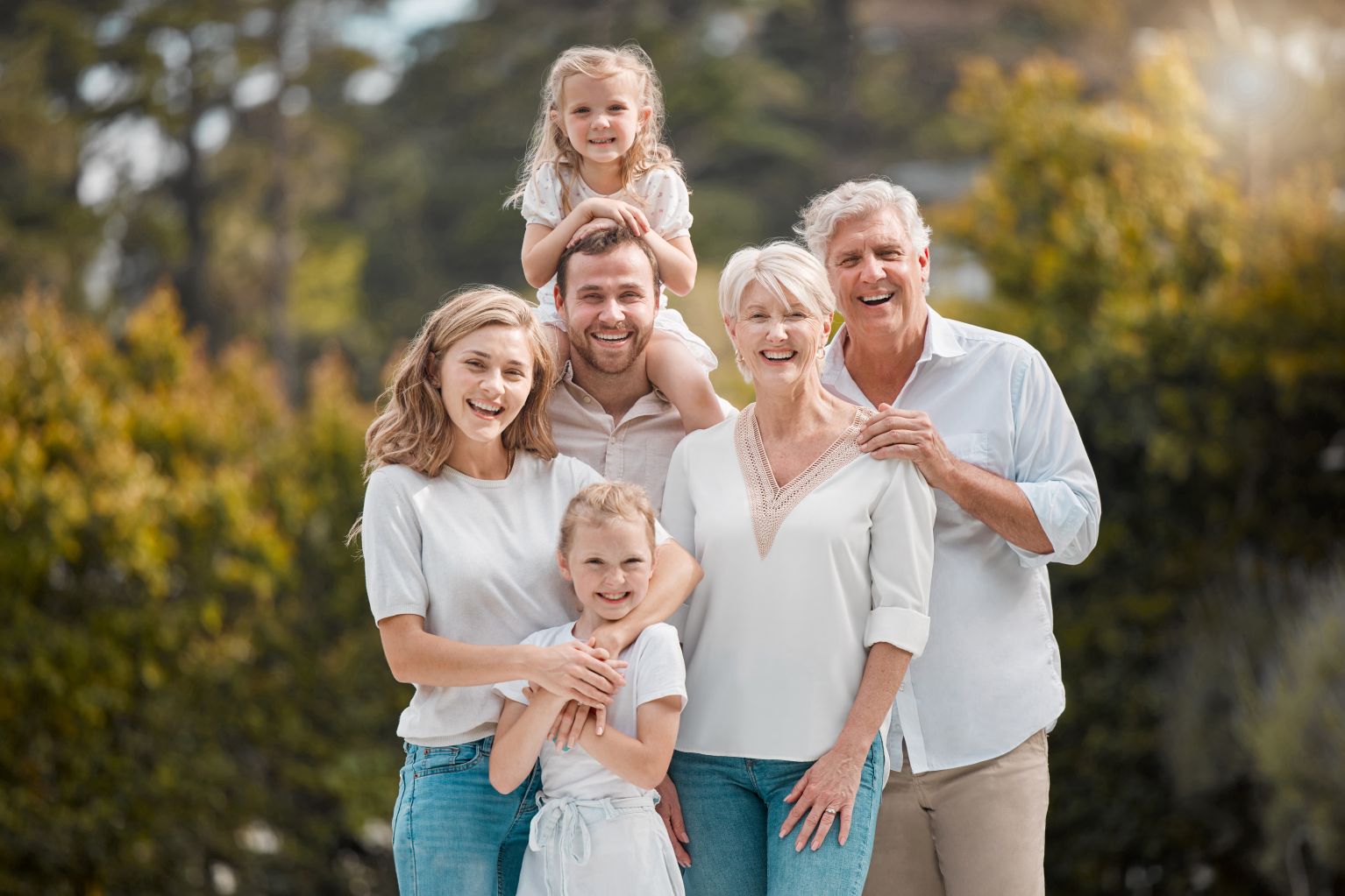 Portrait of big family in park with smile